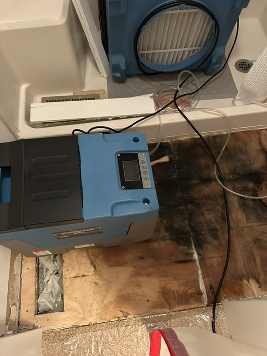 Dehumidifier Detail on Damaged Floor